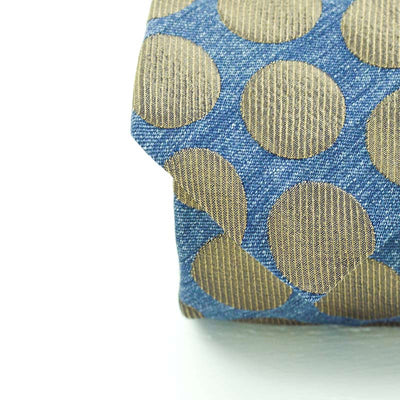 Cravatta a 7 pieghe Fatta a mano con pattern a bolli color daino su fondo blu jeans